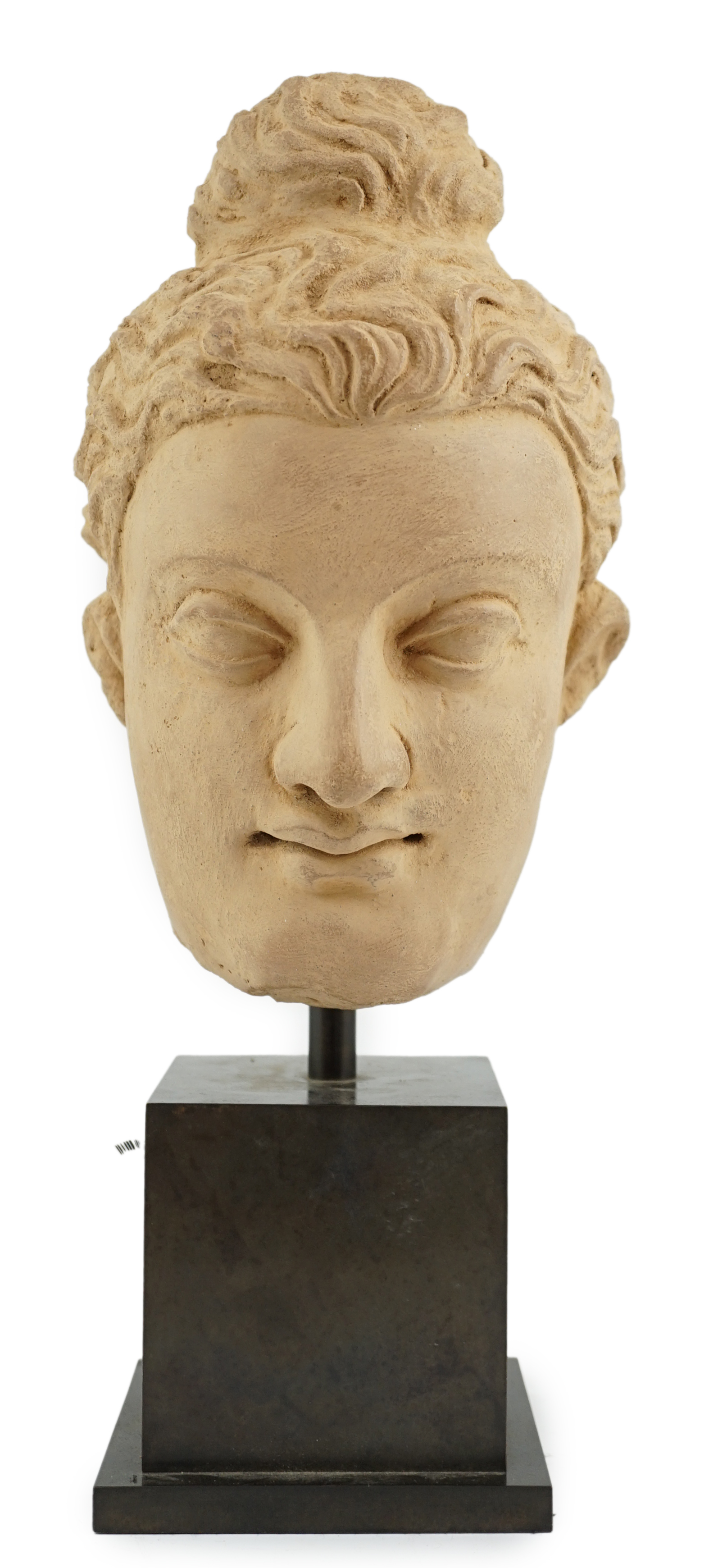 A stucco head of Buddha, Gandhara, Kushan period, 3rd/4th century AD